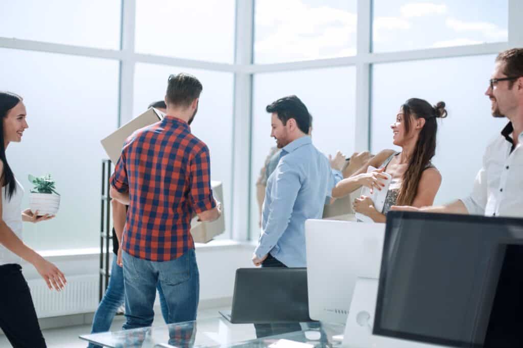 Office workers in their new office