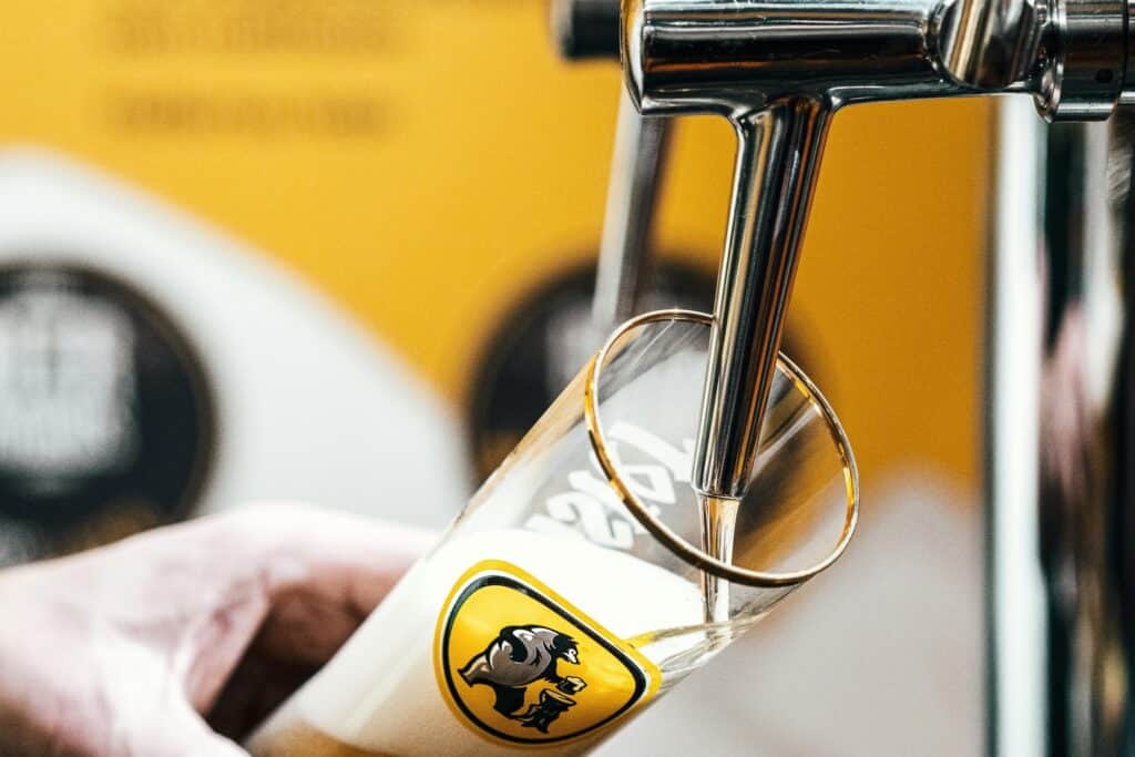 At a pub: closeup of a glass being filled with beer